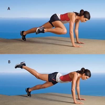 woman showing how to do the Plank Knee to Elbow exercise https://get-strong.fit/Plank-Knee-to-Elbow-How-to-Exercise-Guide/Exercises